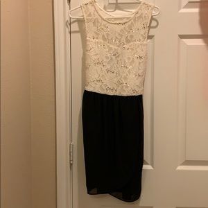 Black and golden laced dress with belt